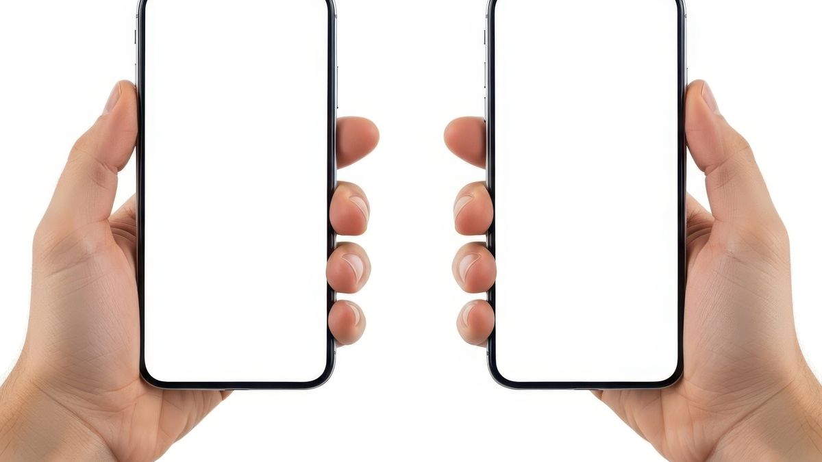 Hands holding two modern smartphones comparing photo cleaner apps side by side